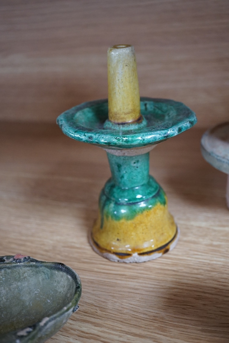 Four Tang dynasty and later pottery items, to include an ear cup, largest 15cm high. Condition - fair